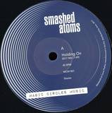 Smashed Atoms - Holding On
